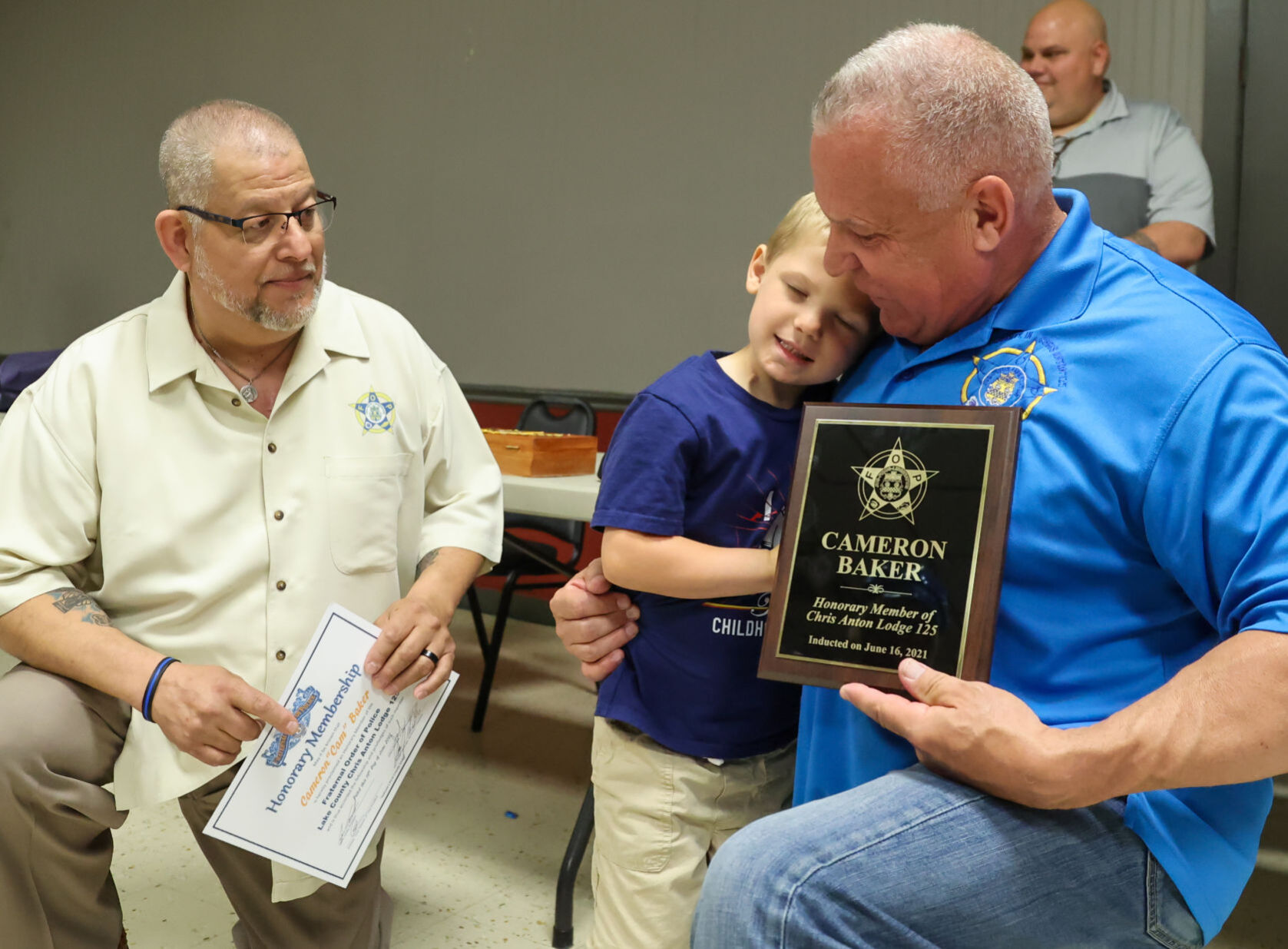 Cameron Baker gets an honorary badge